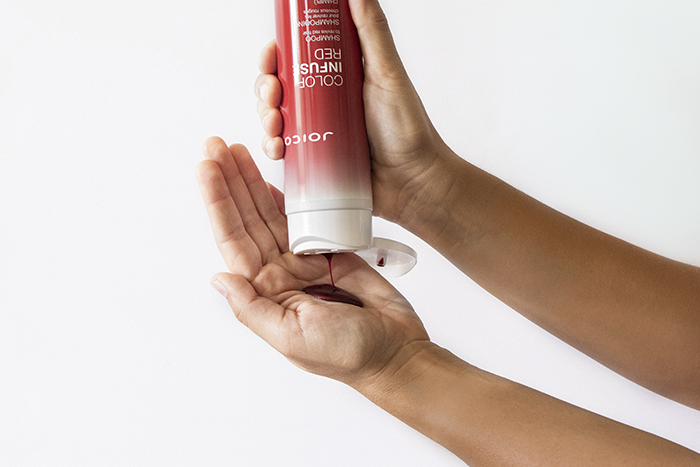 Joico Color Infuse Red shampoo in hand