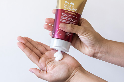 K-PAK Color Therapy Masque in hand