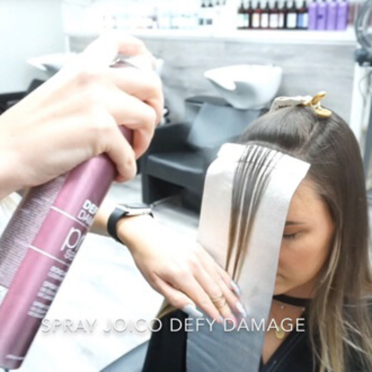 Womens Hair being colored with hair dye