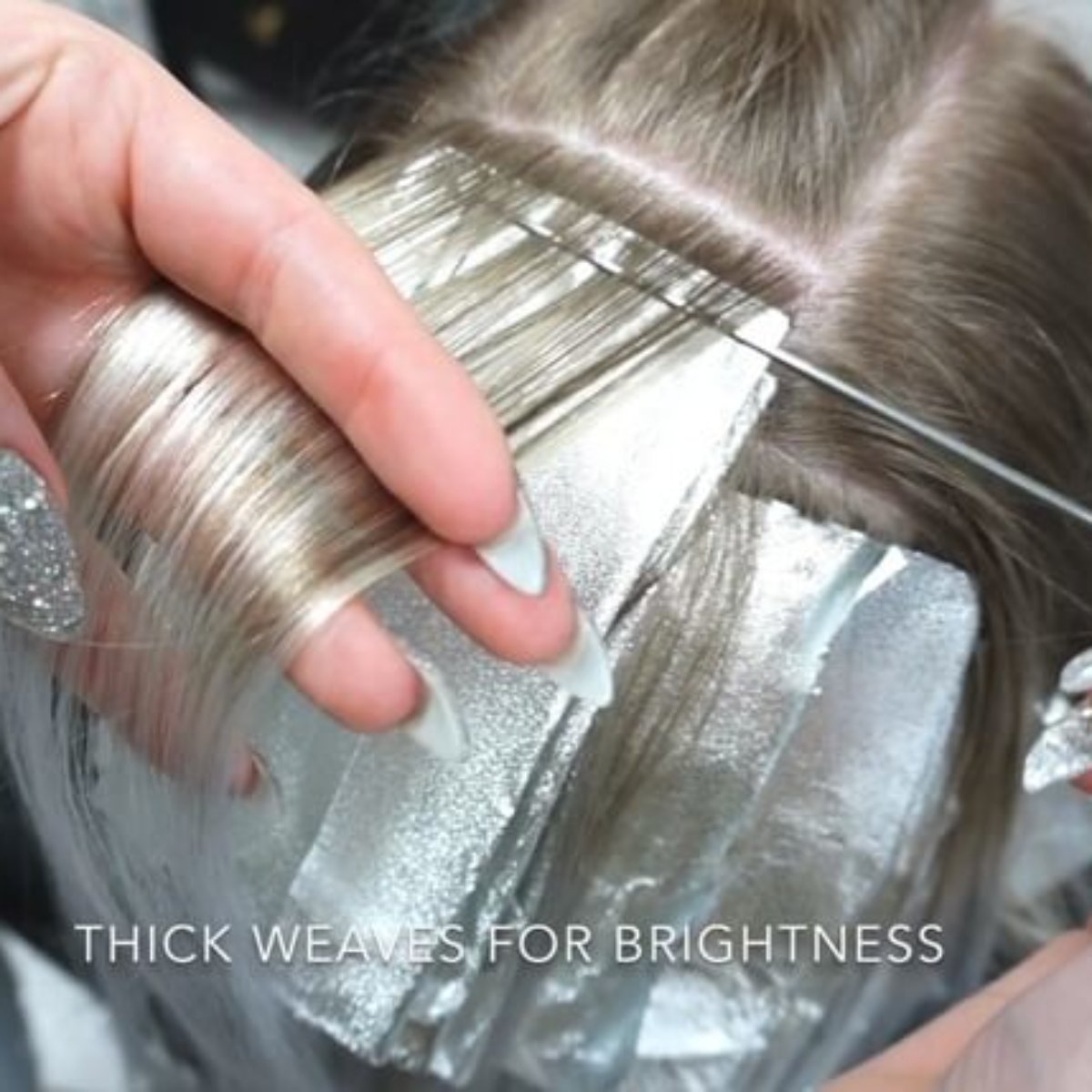 Hair being foiled with hair color