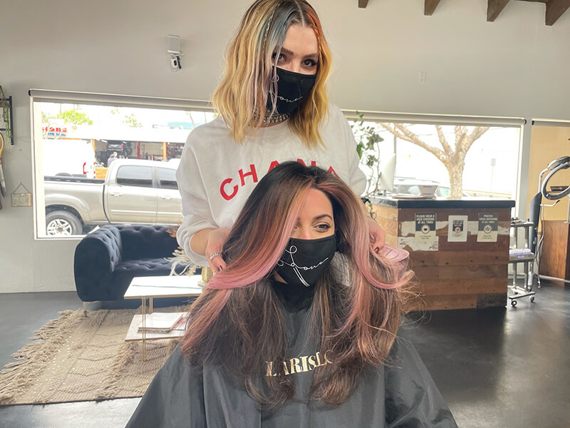 hair stylist with client