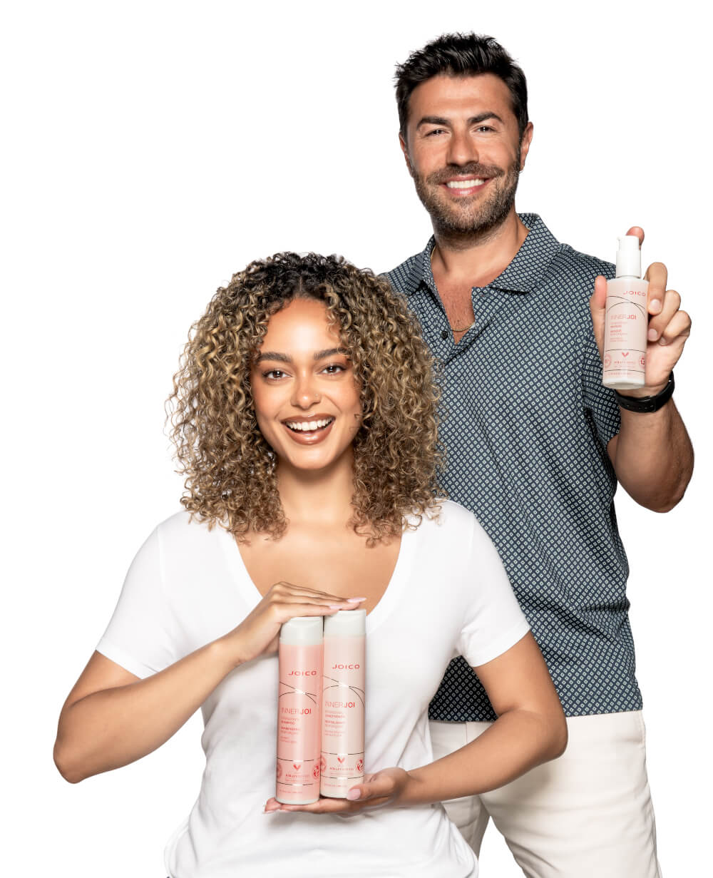 hair model and richard mannah showing strengthen hair products